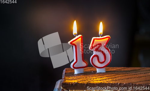 Image of Thirteenth Birthday cake with candles