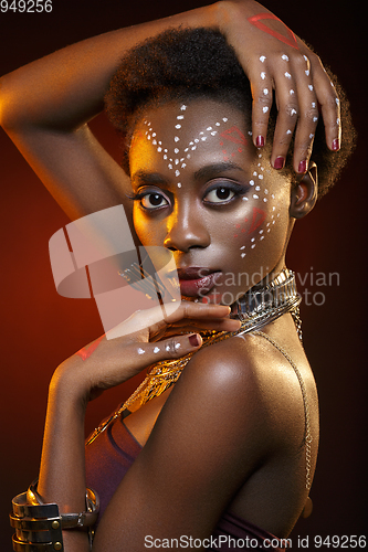 Image of Beautiful afro girl with drawings on skin