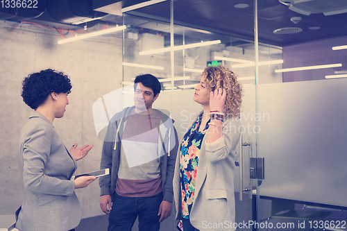 Image of Startup business team at a meeting in modern office building