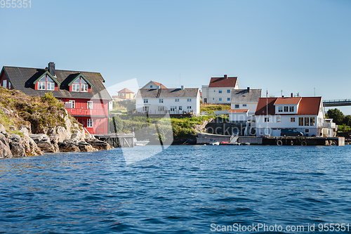 Image of view on norwegian fjord with houses along coastline