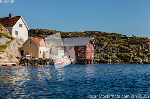 Image of view on norwegian fjord with houses along coastline