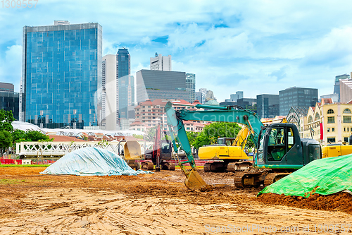 Image of Excavators at construction site, Singapore
