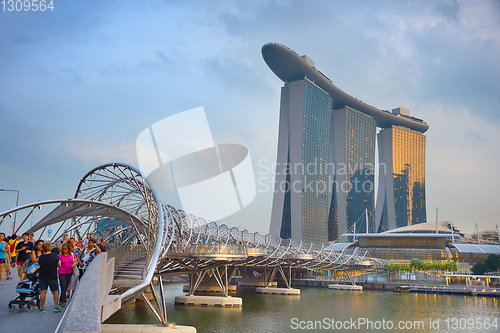 Image of People walking by Marina Bay