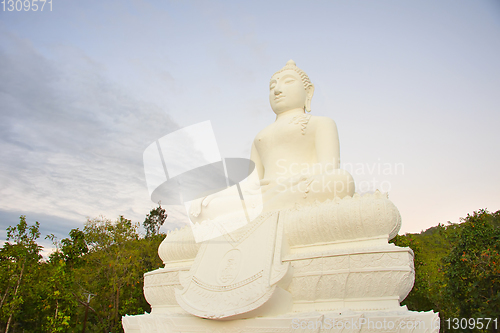 Image of marble statue of sitting Buddha