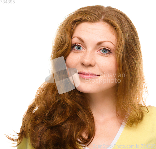 Image of Portrait of a young cheerful woman