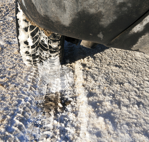 Image of Snow adhering to the car