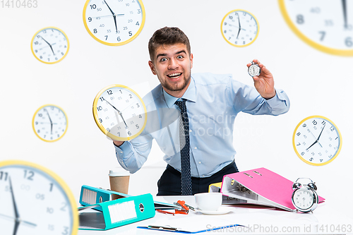 Image of Young man can\'t wait to go home from the nasty office