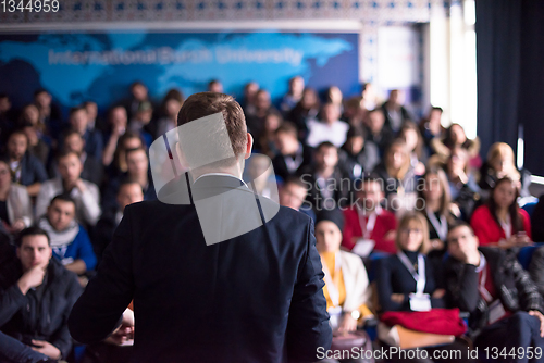 Image of successful businessman giving presentations at conference room