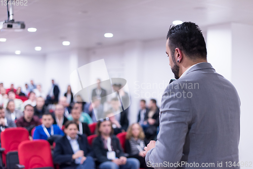 Image of successful businessman giving presentations at conference room