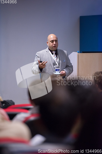 Image of successful businessman giving presentations at conference room