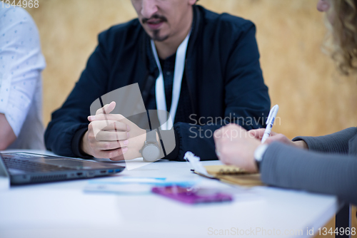 Image of Business woman writing notes