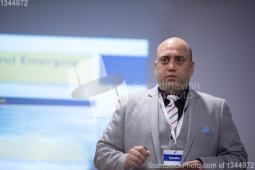 Image of successful businessman giving presentations at conference room