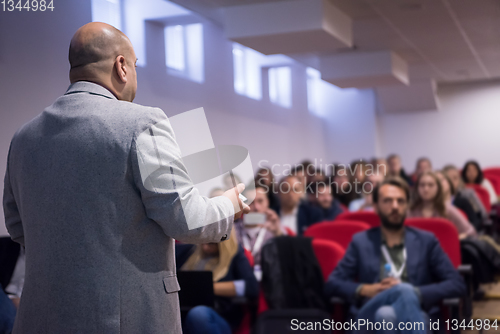 Image of successful businessman giving presentations at conference room