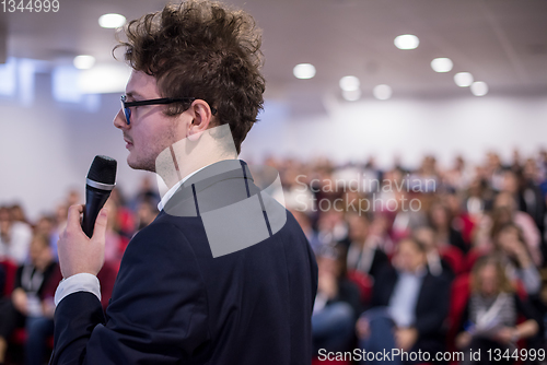 Image of successful businessman giving presentations at conference room