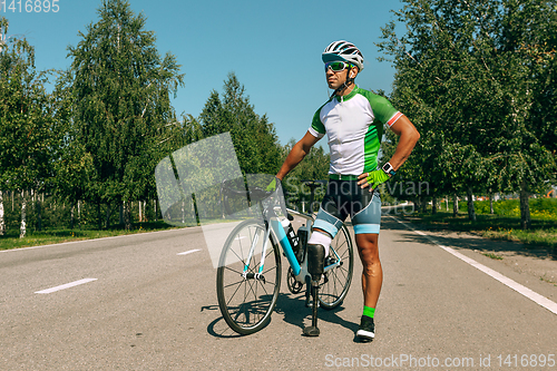 Image of Athlete disabled amputee training in cycling