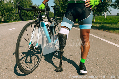 Image of Athlete disabled amputee training in cycling