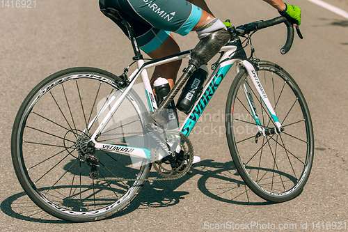 Image of Dnipro, Ukraine - July 12, 2019: athlete with disabilities or amputee training in cycling