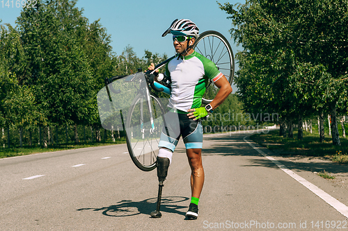 Image of Athlete disabled amputee training in cycling