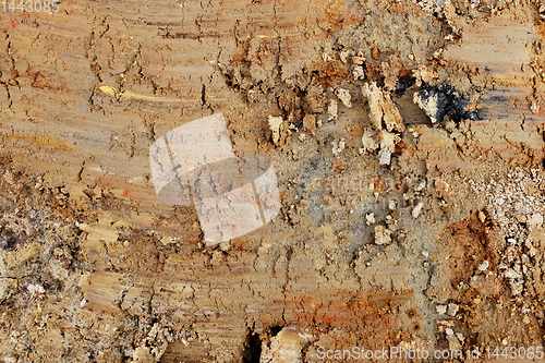Image of Rough brown Weald clay background, streaked with colours