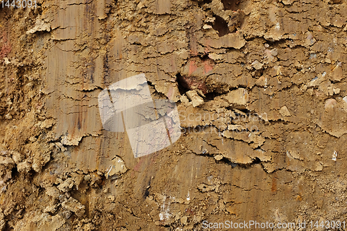 Image of Smooth golden brown Weald clay background - with streaks of colo