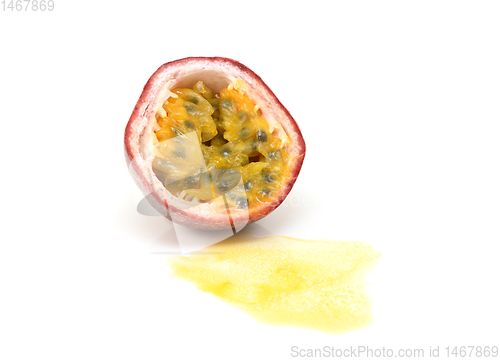 Image of Half a purple passion fruit in cross section