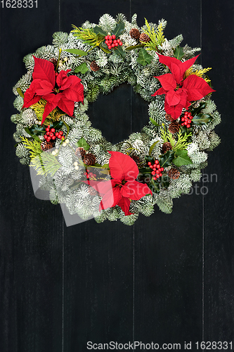 Image of Poinsettia Flower and Winter Greenery Wreath