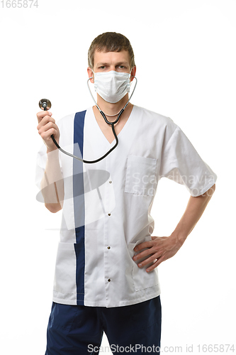 Image of Doctor in mask with phonendoscope in hands isolated on white background