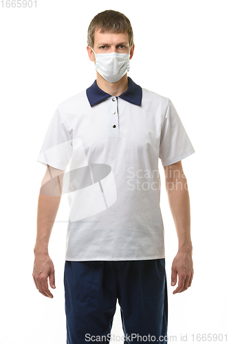 Image of Portrait of a doctor in a medical mask on a white background