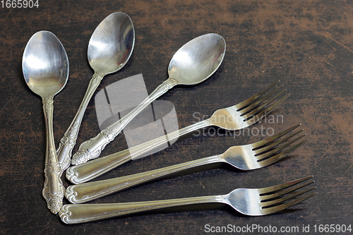 Image of Cutlery is on the old table