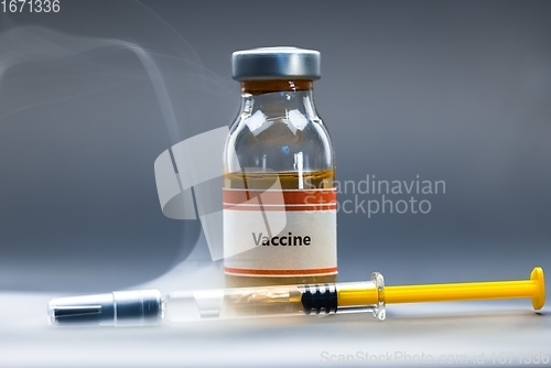 Image of Vaccine for virus in small bottles