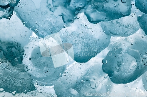 Image of Ice cubes as background texture closeup photo