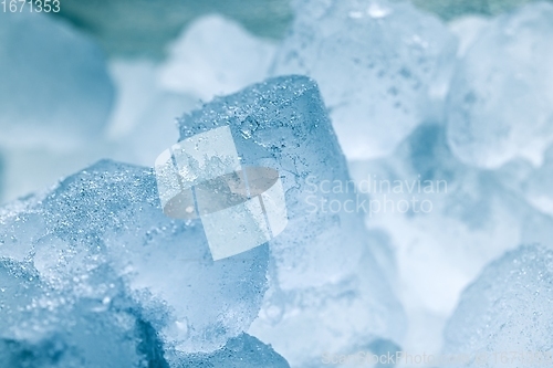 Image of Ice cubes as background texture closeup photo