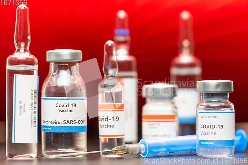 Image of Vaccine for virus in small bottles