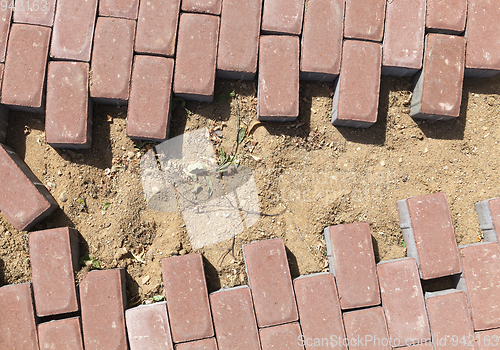 Image of Paving the footpath