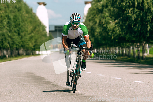 Image of Athlete disabled amputee training in cycling