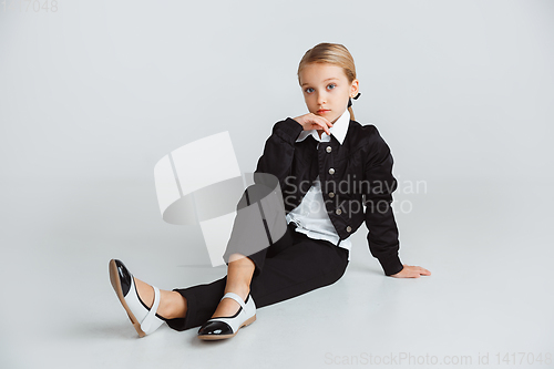 Image of Girl preparing for school after a long summer break. Back to school.