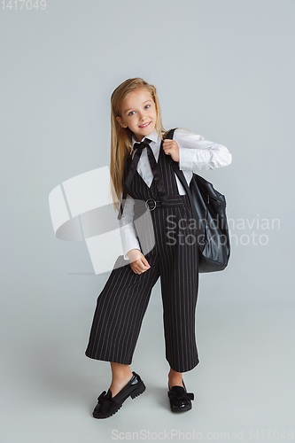 Image of Girl preparing for school after a long summer break. Back to school.