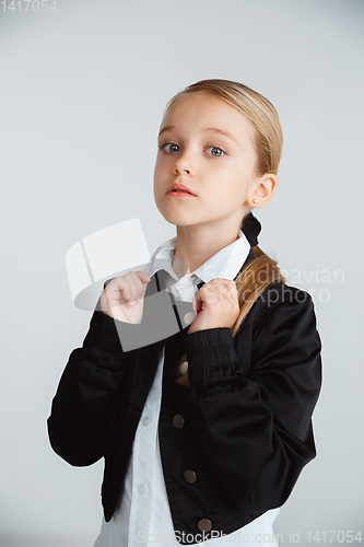 Image of Girl preparing for school after a long summer break. Back to school.