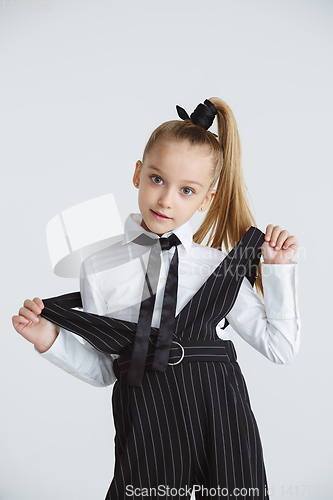 Image of Girl preparing for school after a long summer break. Back to school.