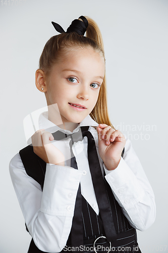 Image of Girl preparing for school after a long summer break. Back to school.