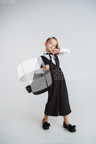 Image of Girl preparing for school after a long summer break. Back to school.