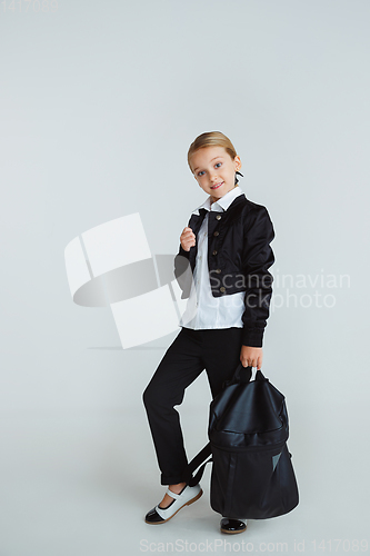 Image of Girl preparing for school after a long summer break. Back to school.