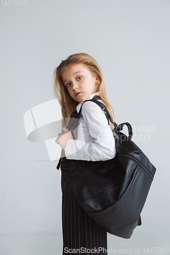 Image of Girl preparing for school after a long summer break. Back to school.