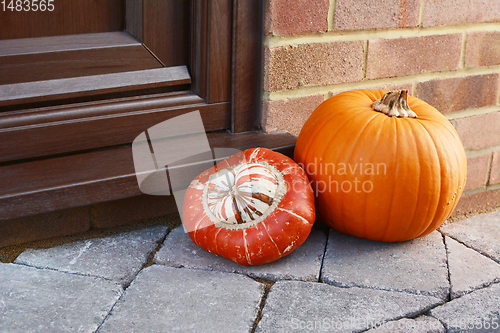 Image of Turks Turban gourd and an orange pumpkin as autumnal decoration