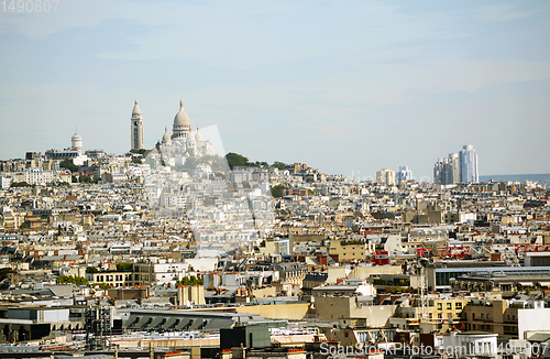 Image of Sacre Coeur basilica and Chateau d\'eau Montmartre on the hill