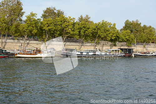 Image of Small riverboats moored on the Seine in Paris