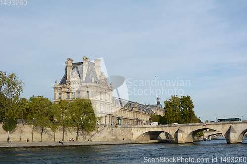 Image of Louvre Palace building at Pont Royal bridge over the Seine