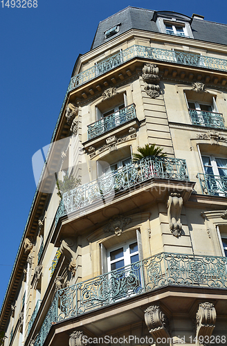 Image of Ornate cast iron balconies on a building in Paris 