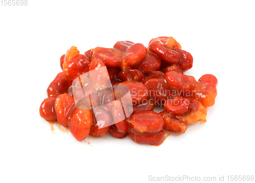 Image of Pile of sticky, red bitter melon seeds 