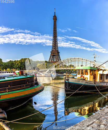 Image of Two river boats near Eiffel tower in Paris, France